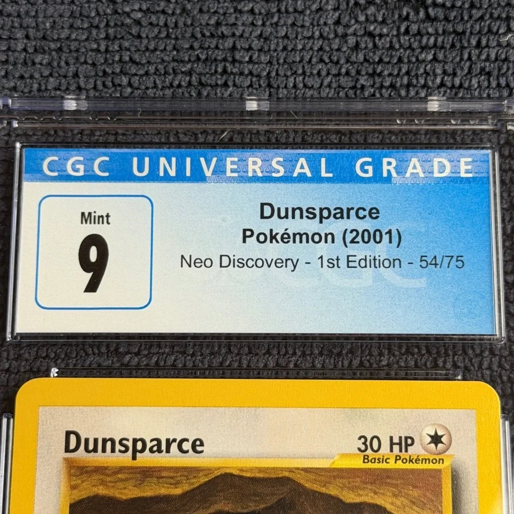 Pokemon Dunsparce 54/75 1st Edition CGC 9 Mint 2001 Neo Discovery TCG Vintage